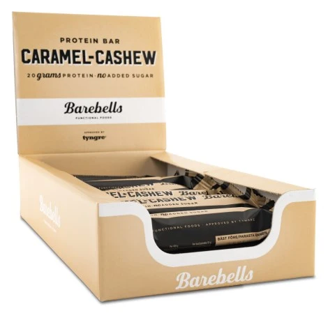 Två Barebells Protein Bars i förpackning, liggande på vit bakgrund – smak Salty Peanut.